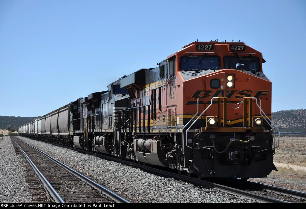 Grain train rolls east